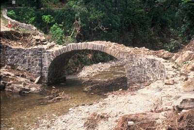 wrecked stone bridge near gwynfynydd